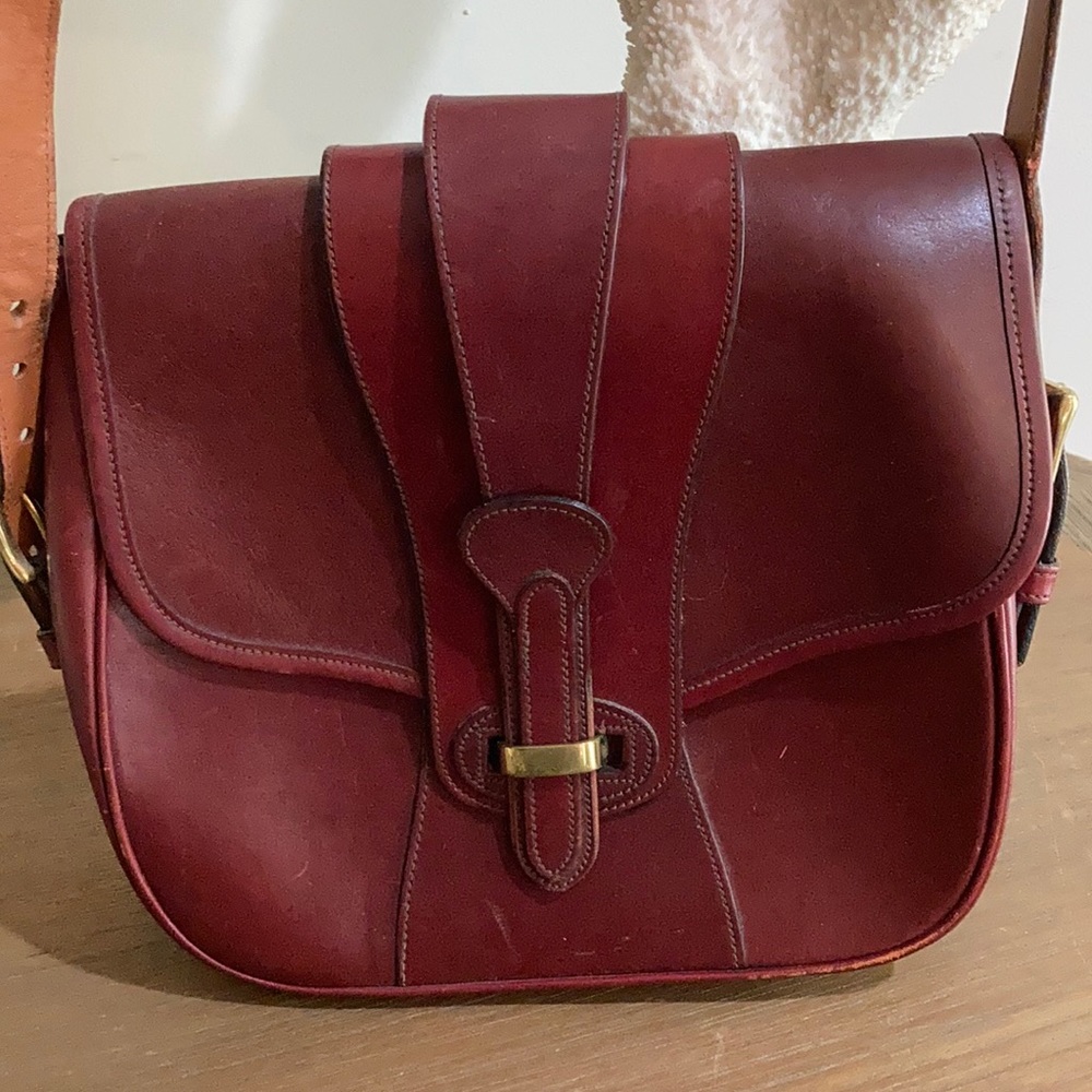 Vintage leather Dooney & Bourke Saddle Shoulder Bag.